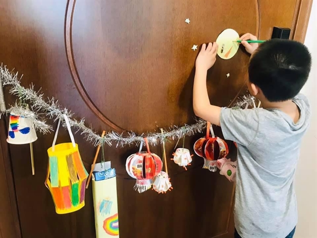 Making recycled toys for Mid-Autumn Festival